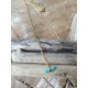 CY necklace brass golden with turquoise cylinder